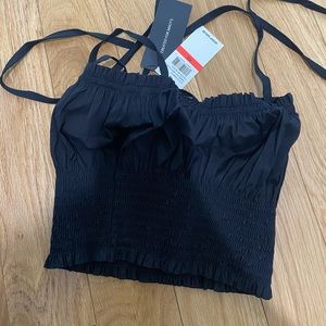 NEVER WORN. Danielle Bernstein smocked tank top.